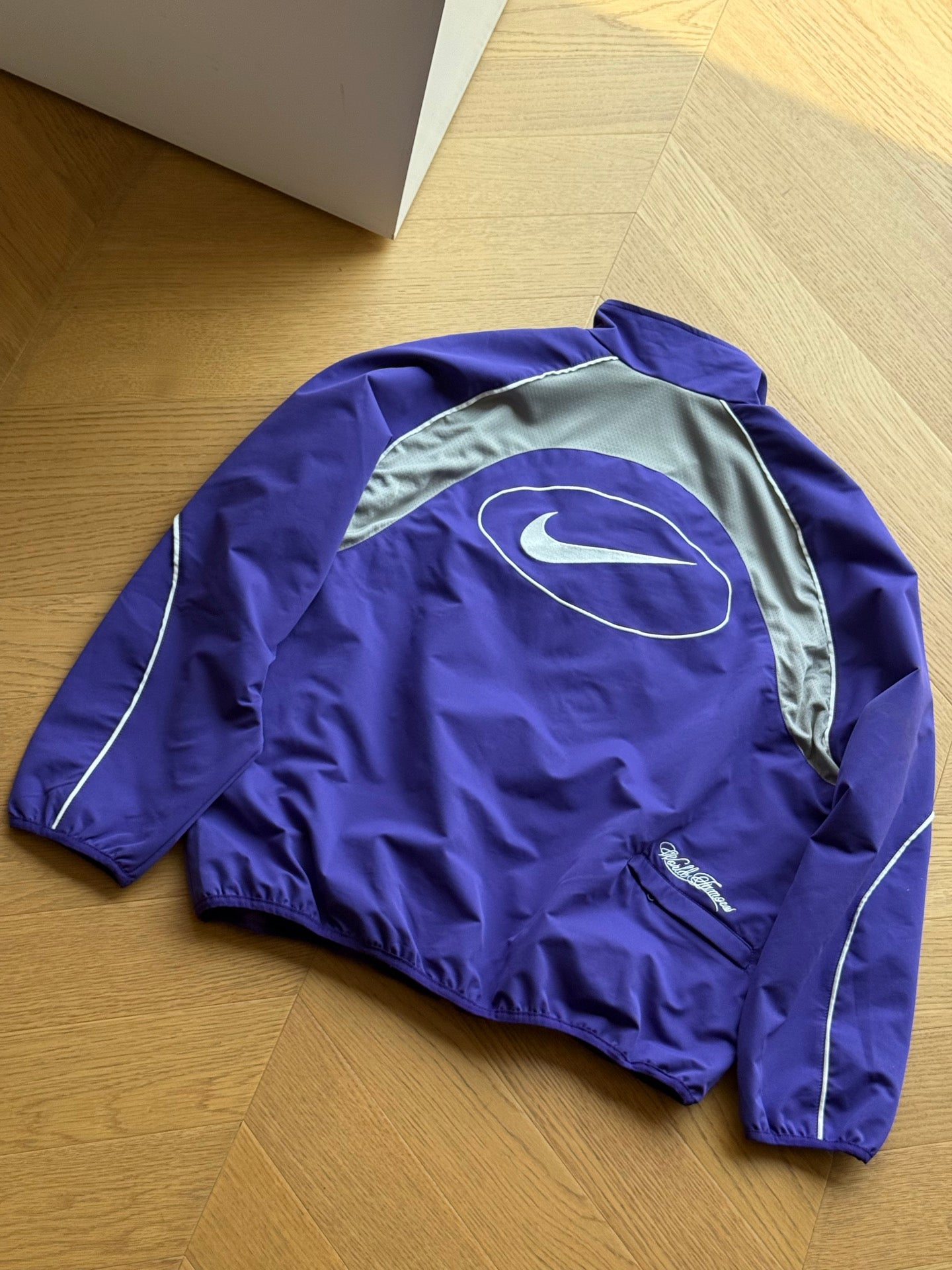 NIKE X SUPREME SWOOSH TRACK JACKET