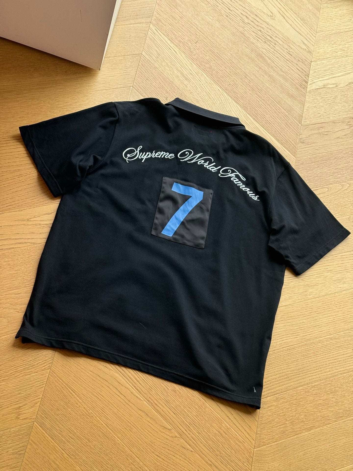 SUPREME WORLD FAMOUS POLO SHIRT