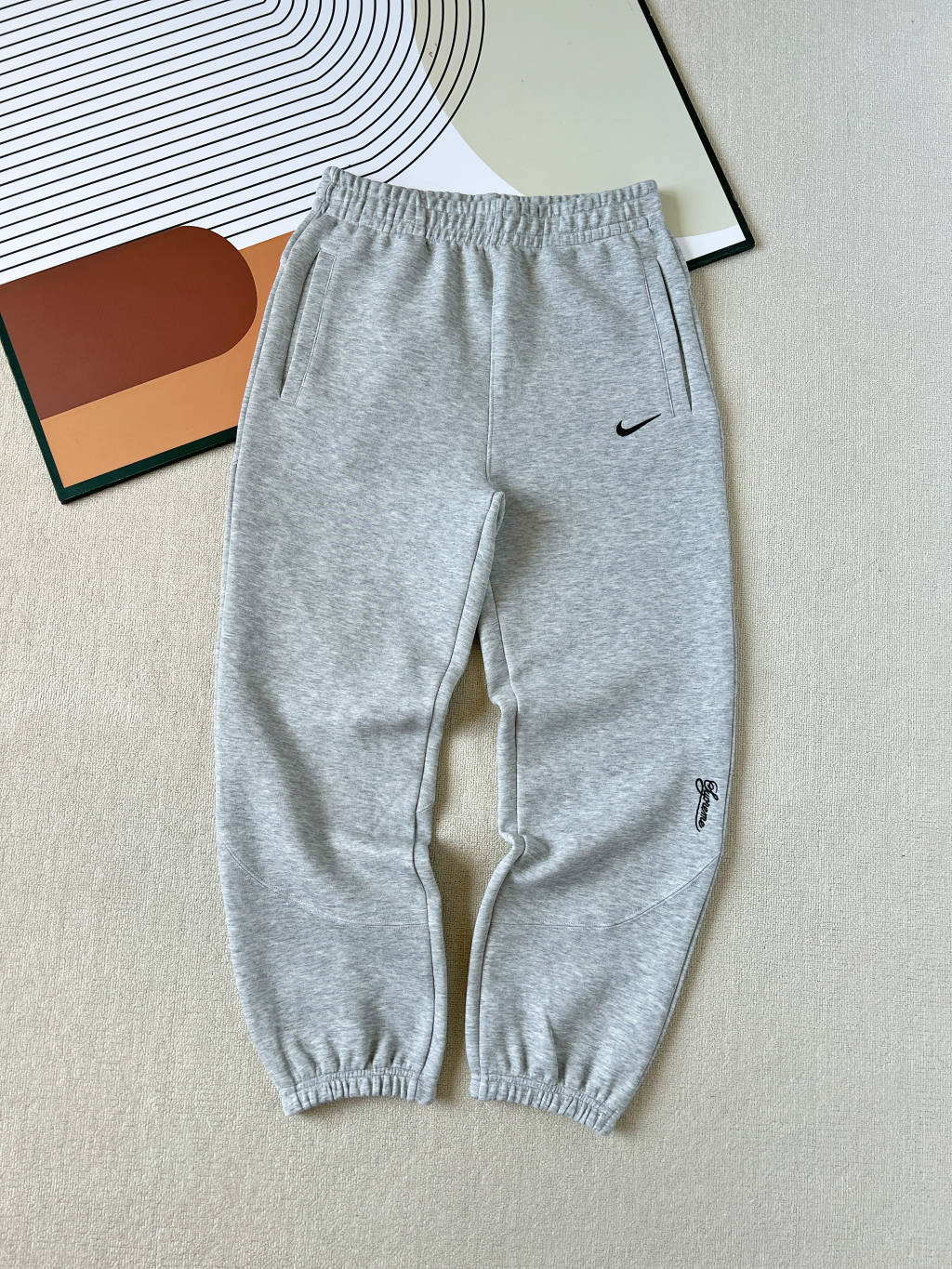 NIKE X SUPREME SWOOSH PANTS