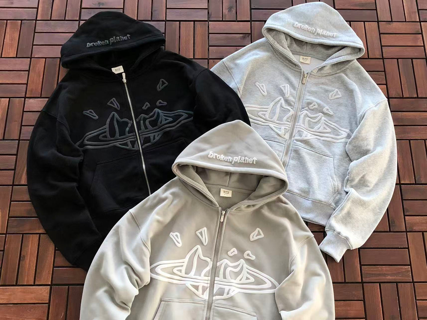 BROKEN PLANETS ZIPPED HOODIE