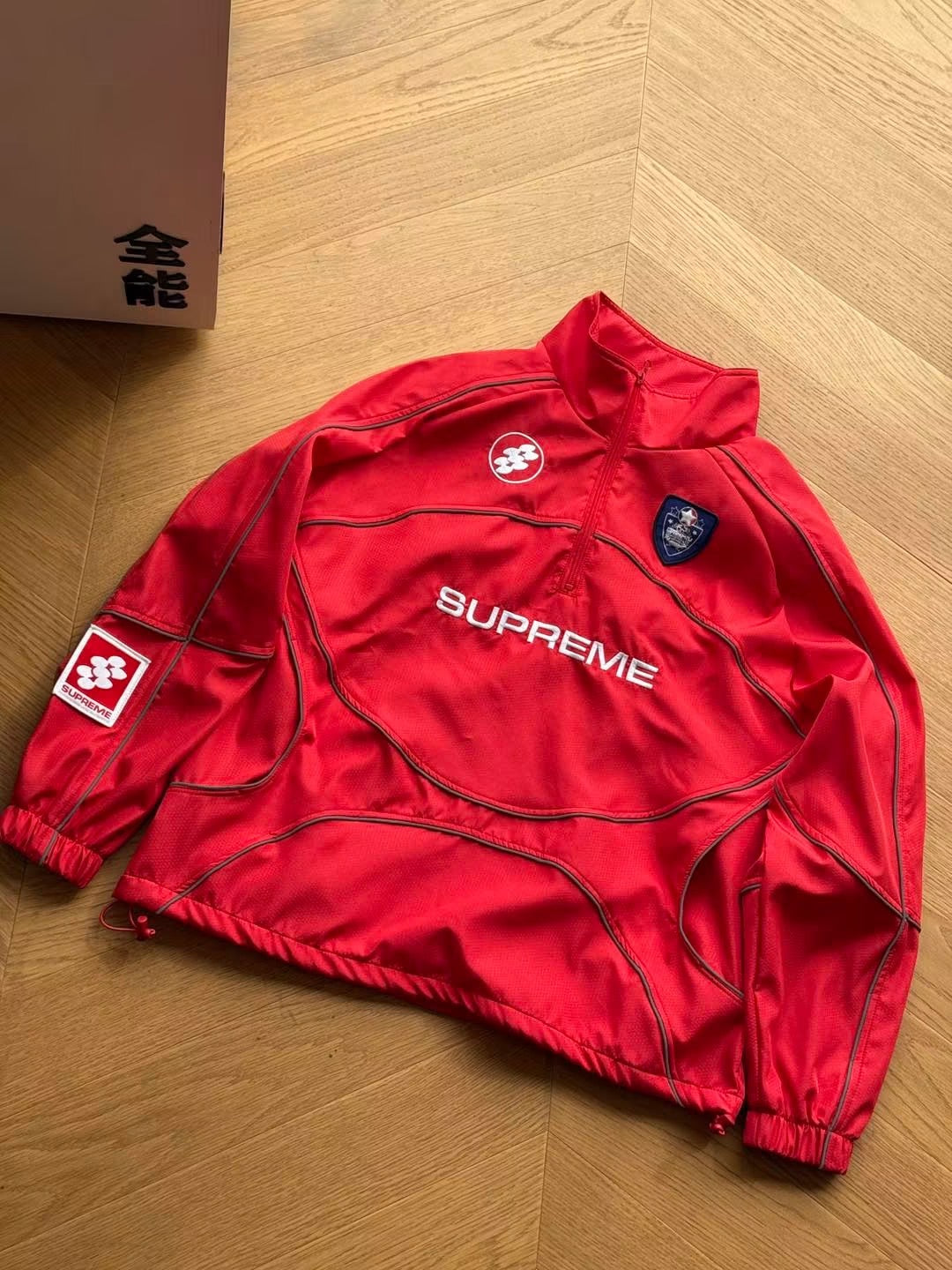 SUPREME REFLECTIVE TRACK JACKET