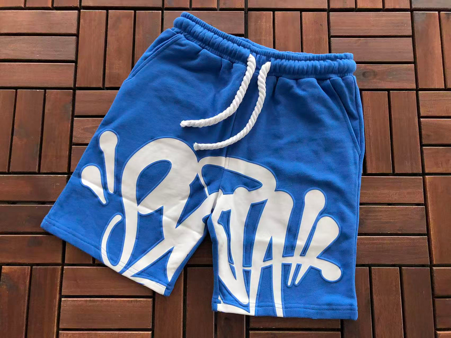 SYNA WORLD LOGO SHORTS