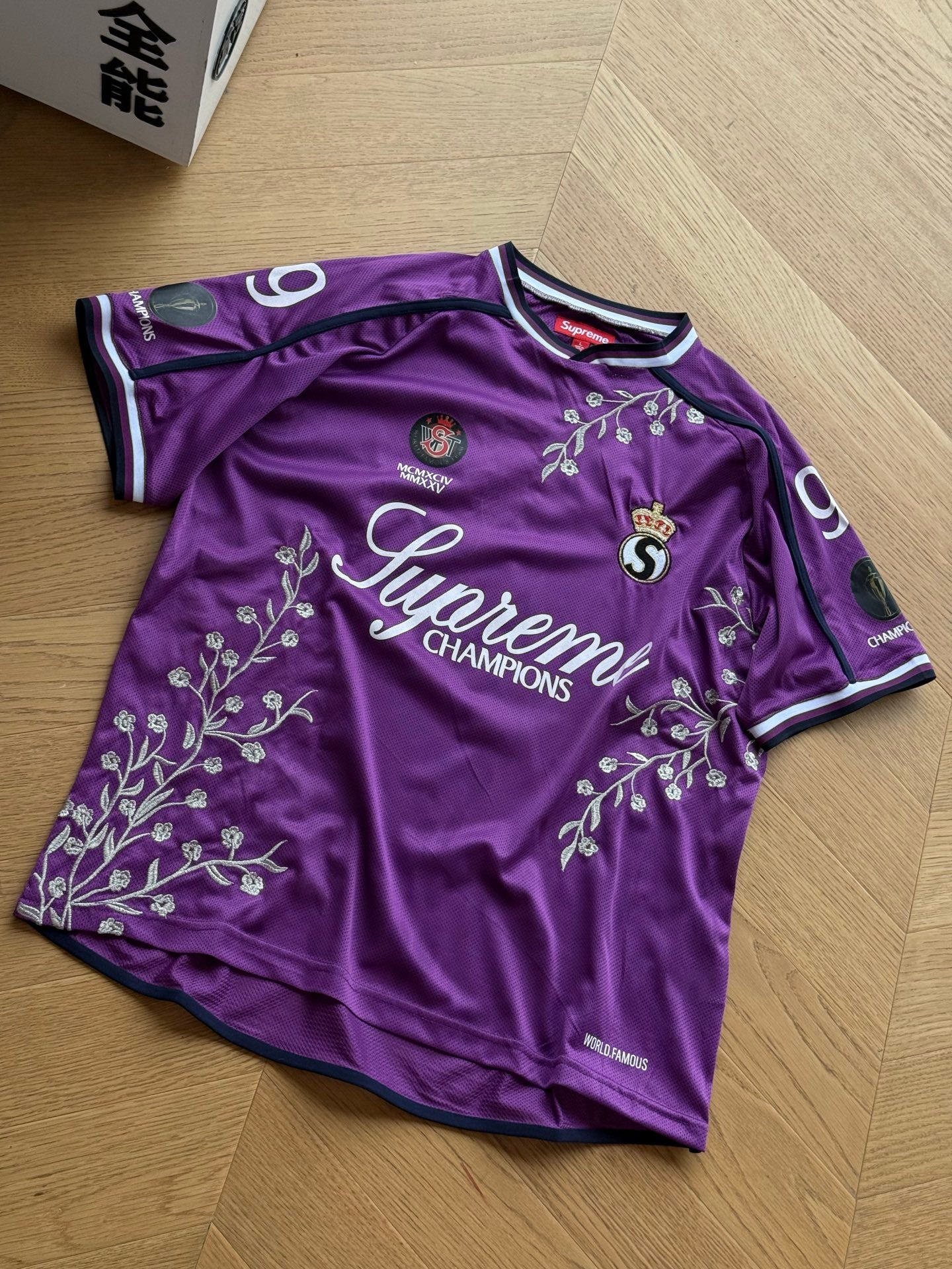 SUPREME CHAMPIONS FOOTBALL JERSEY