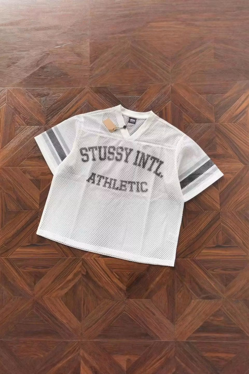 STUSSY INTERNATIONAL ATHLETIC JERSEY