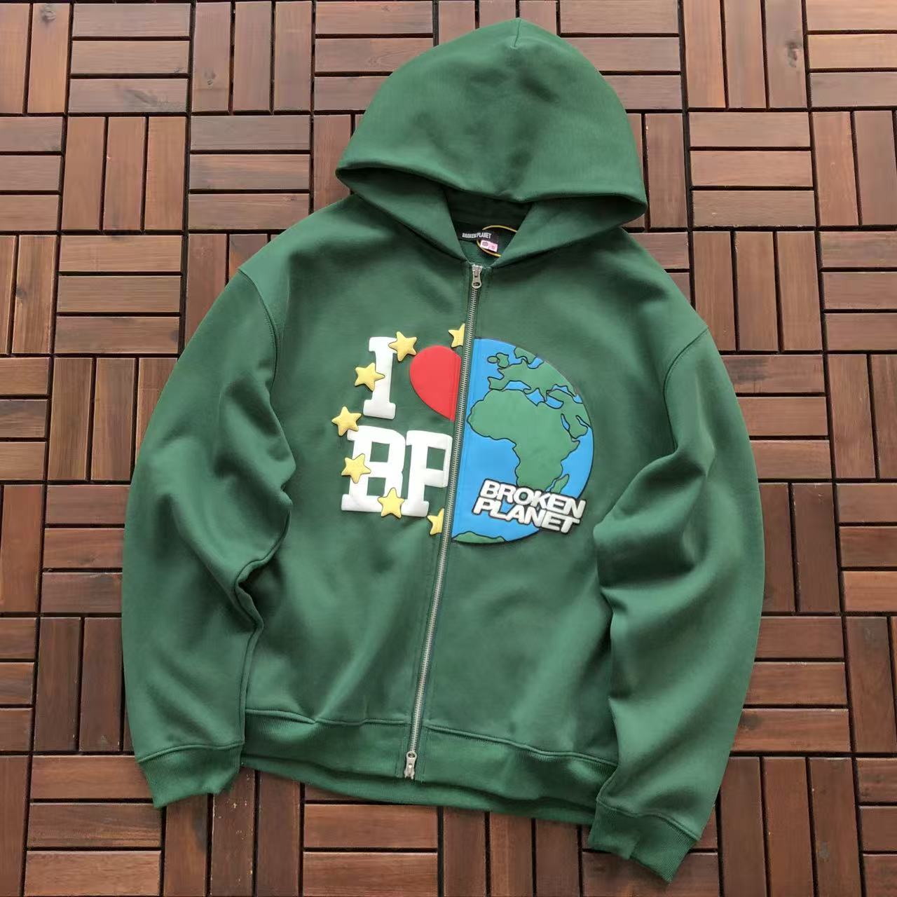 BROKEN PLANETS ZIPPED HOODIE