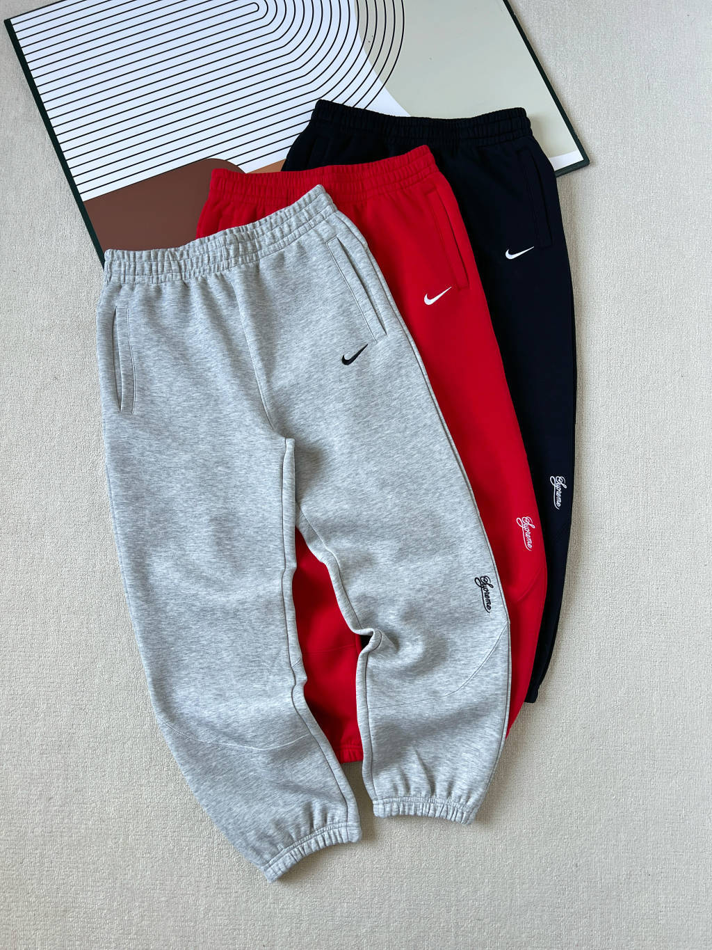 NIKE X SUPREME SWOOSH PANTS