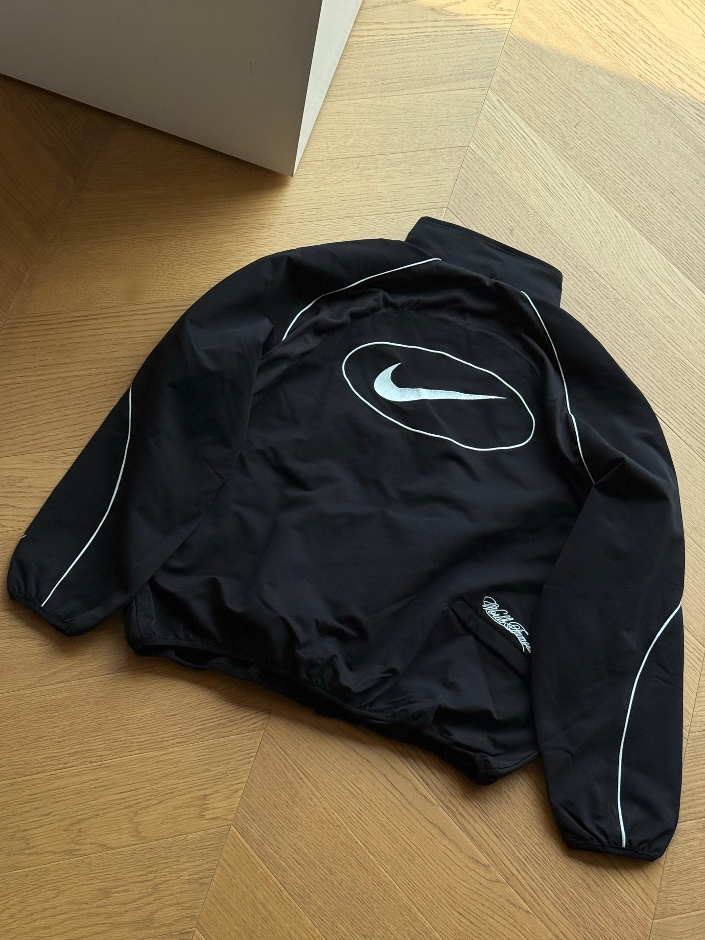 NIKE X SUPREME SWOOSH TRACK JACKET