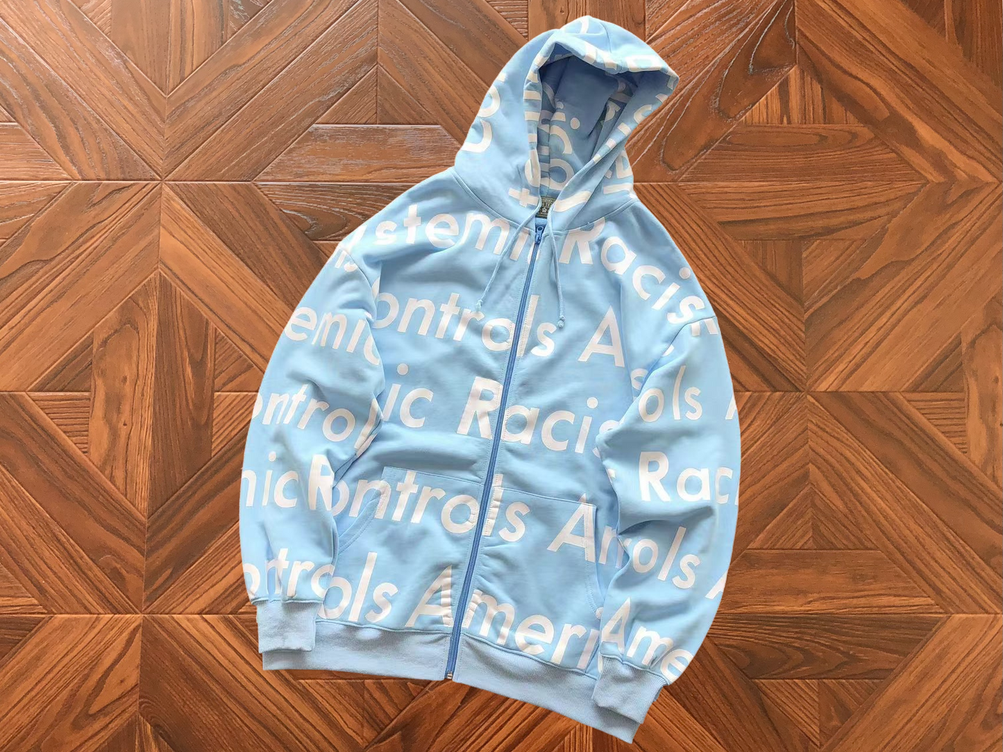 DENIM TEARS X ARTHUR JAFA SYSTEMIC RACISM HOODIE