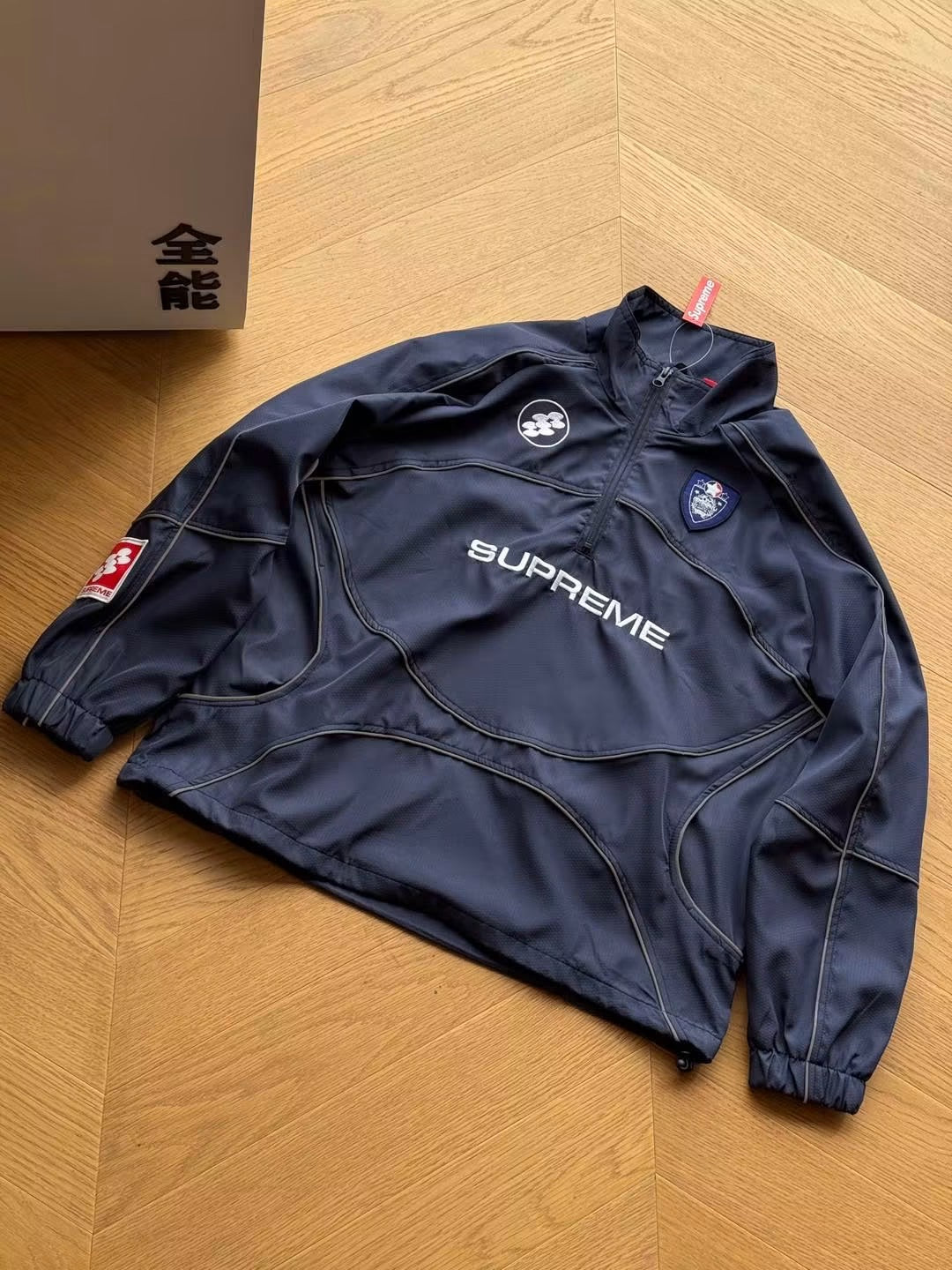 SUPREME  REFLECTIVE TRACK JACKET