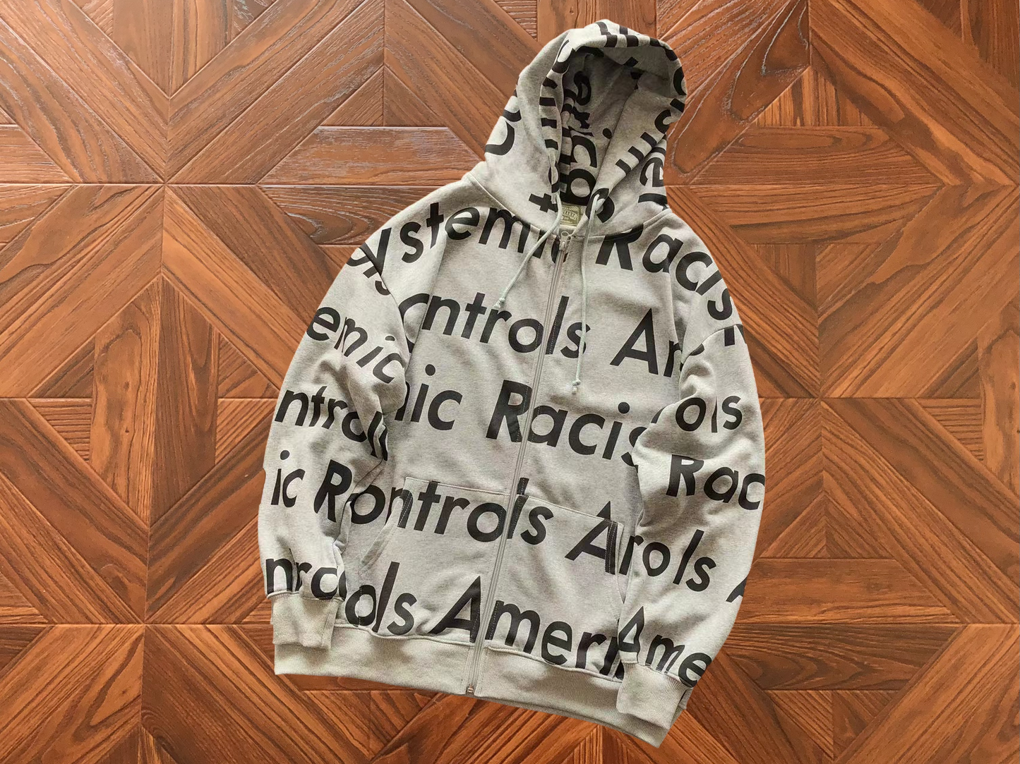 DENIM TEARS X ARTHUR JAFA SYSTEMIC RACISM HOODIE