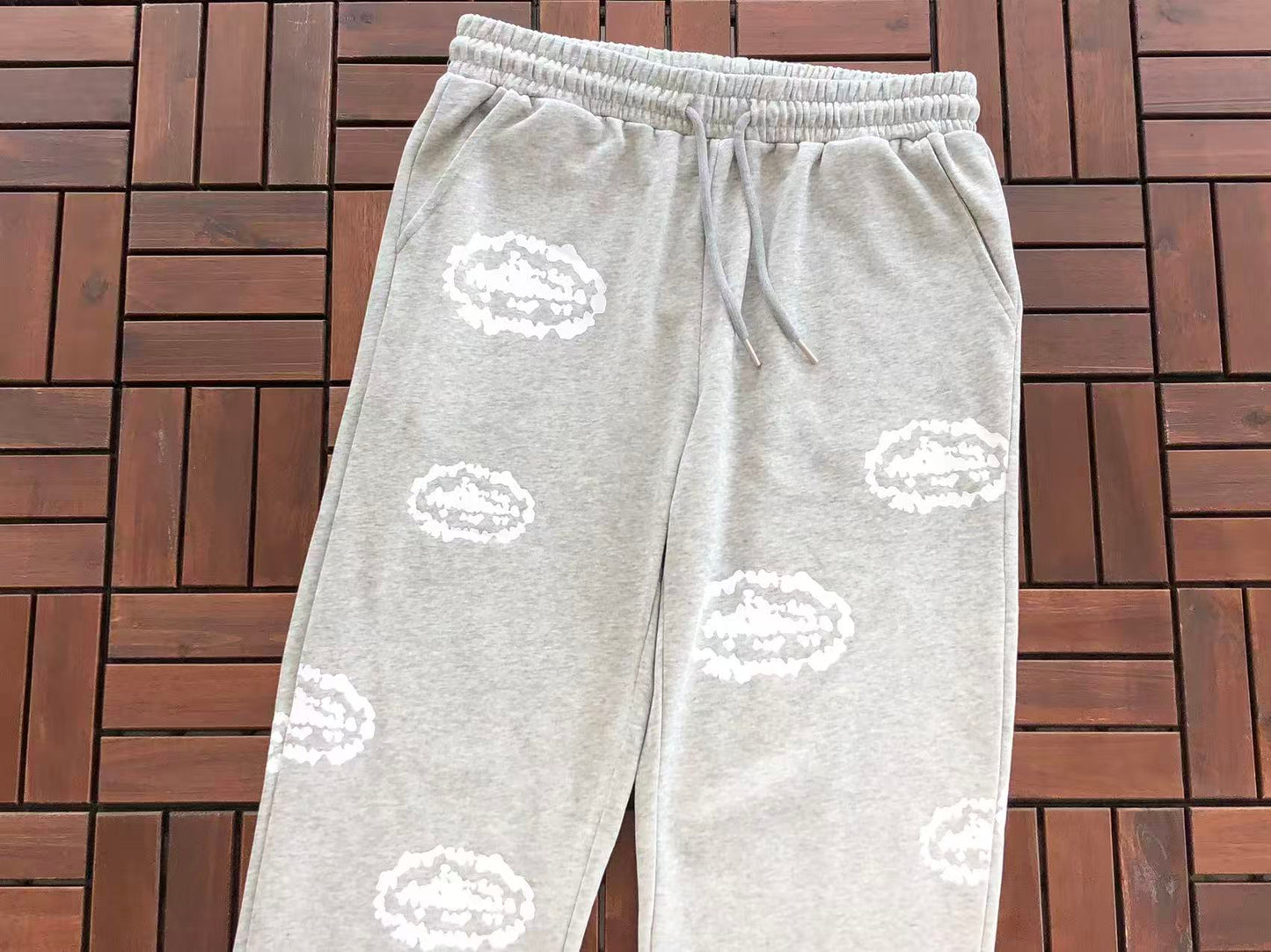 DENIM TEARS X CORTEIZ WREATH PRINT PANTS