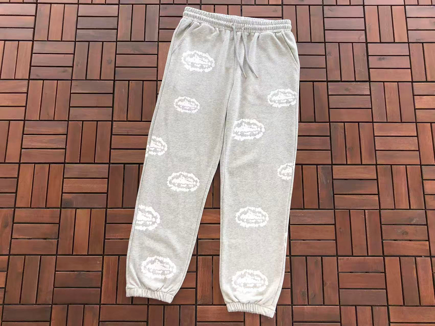 DENIM TEARS X CORTEIZ WREATH PRINT PANTS