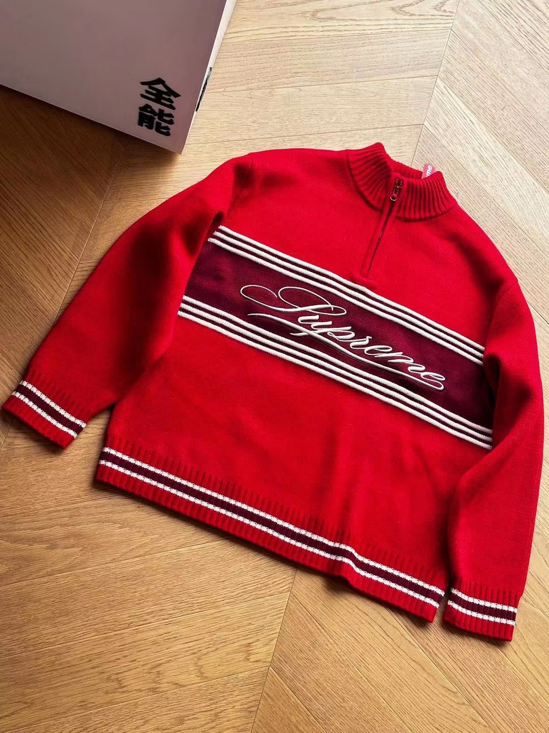 SUPREME SCRIPT STRIPE HALF ZIP SWEATER