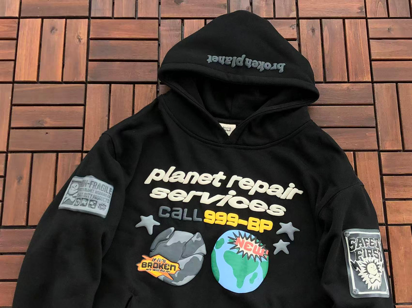 BROKEN PLANETS “PLANET REPAR SERVICES” HOODIE