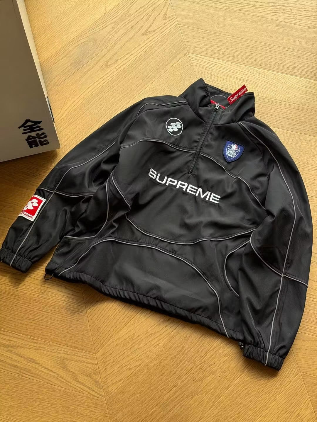 SUPREME  REFLECTIVE TRACK JACKET