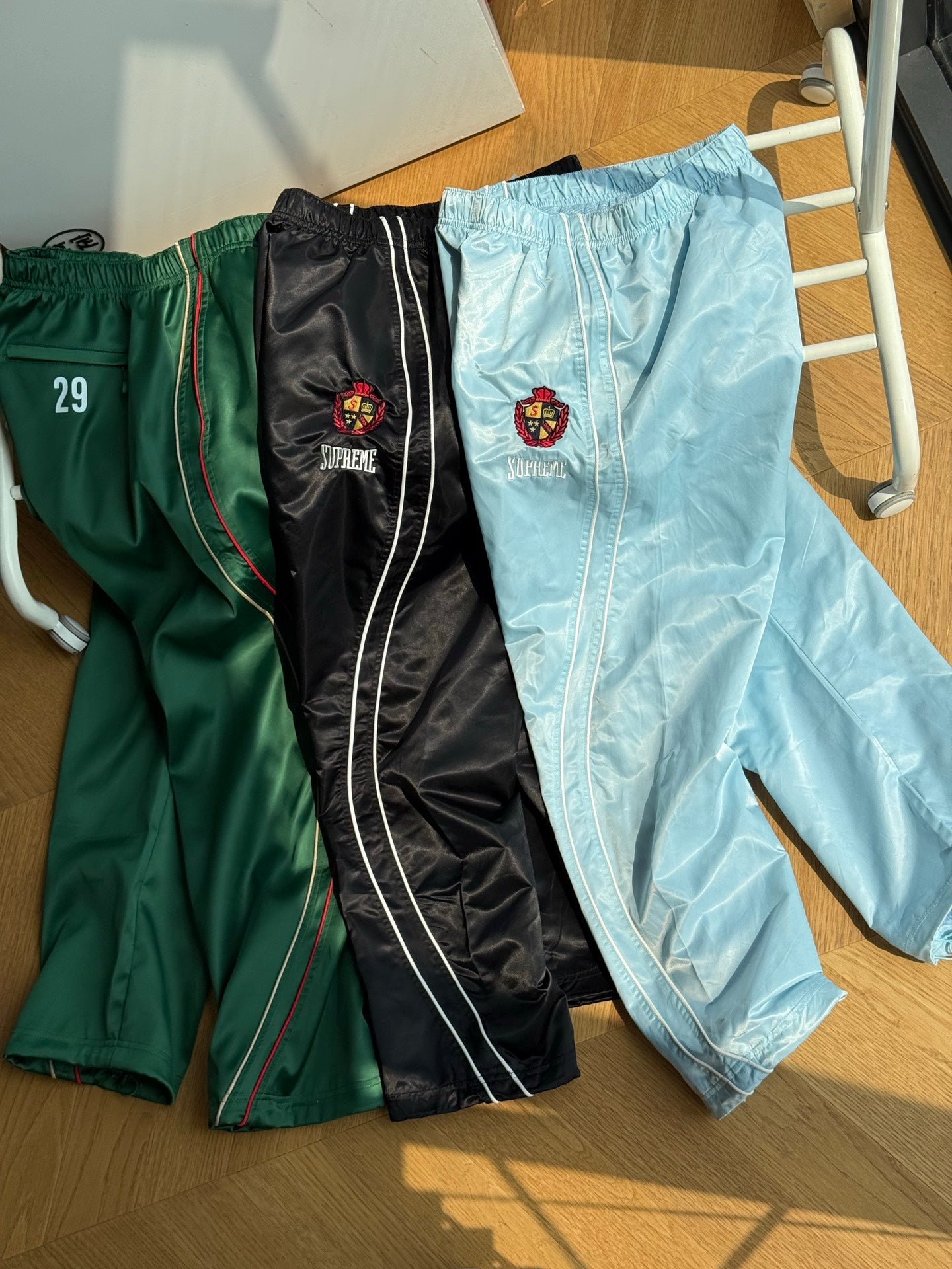 SUPREME TRACK PANTS