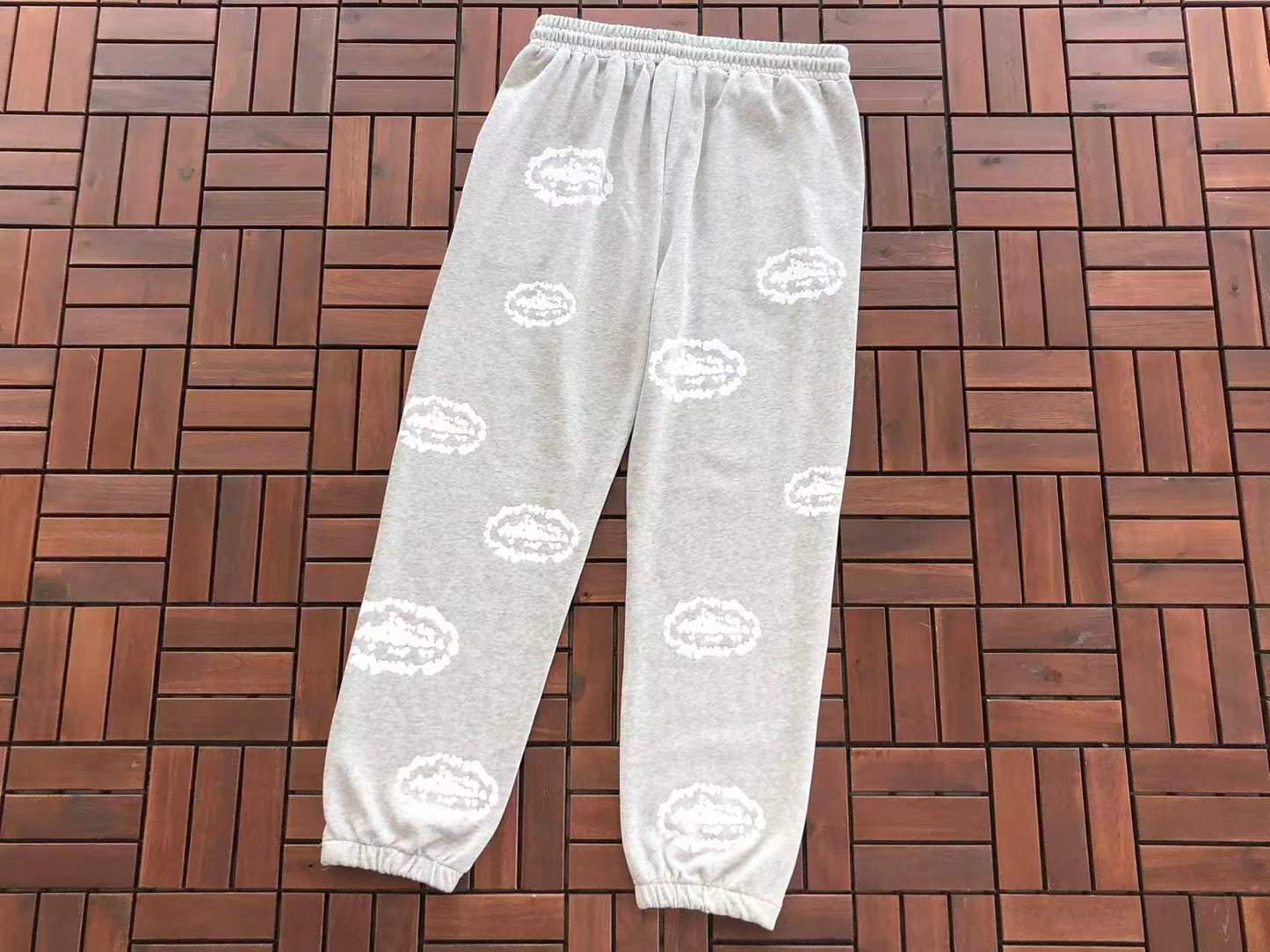 DENIM TEARS X CORTEIZ WREATH PRINT PANTS