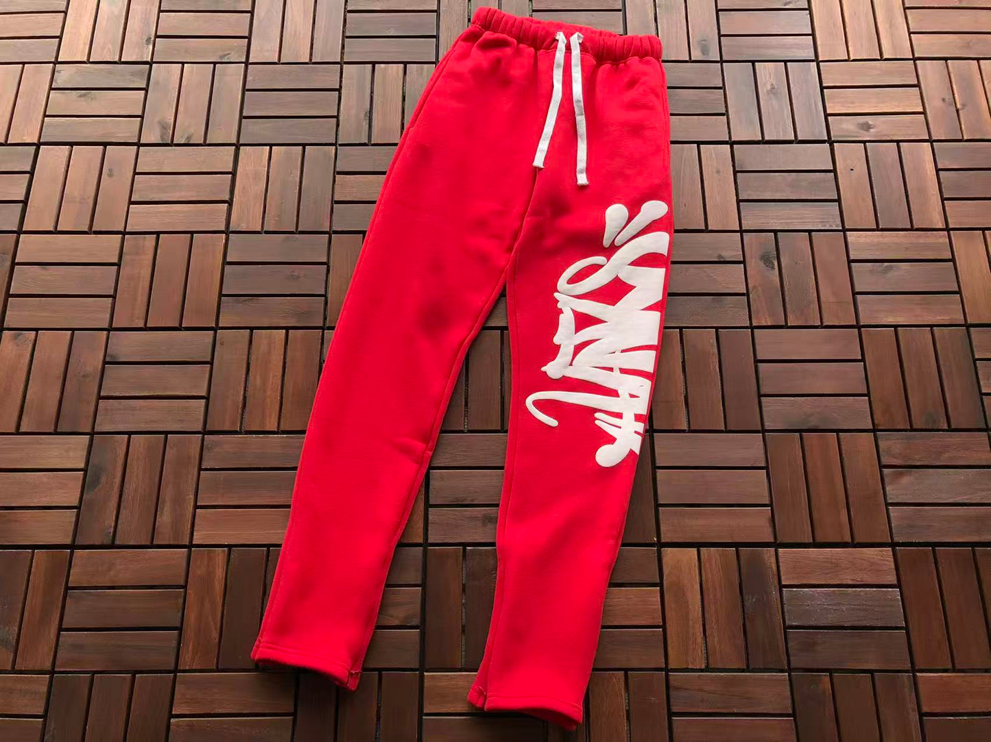 SYNA WORLD LOGO PANTS