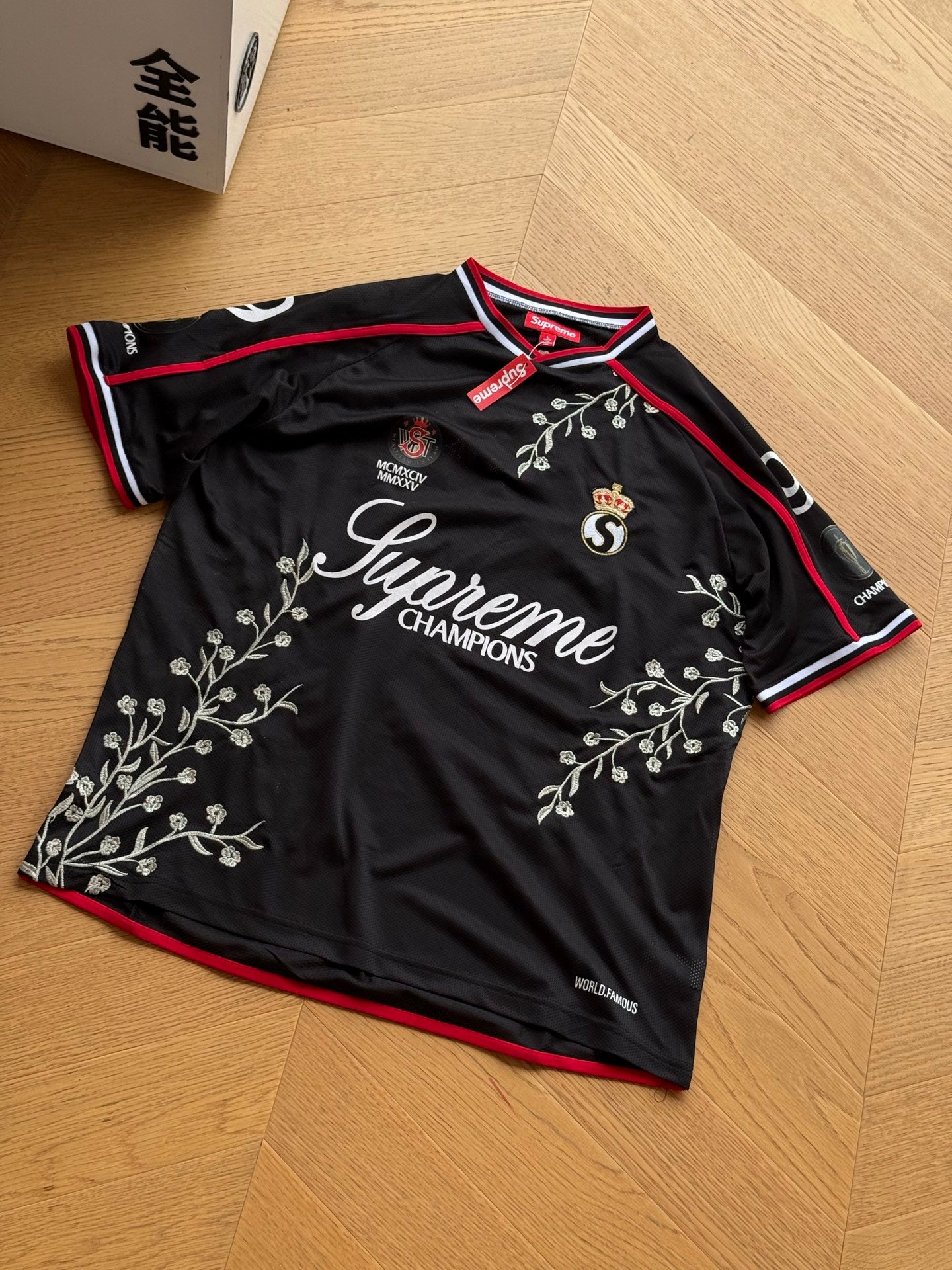 SUPREME CHAMPIONS FOOTBALL JERSEY