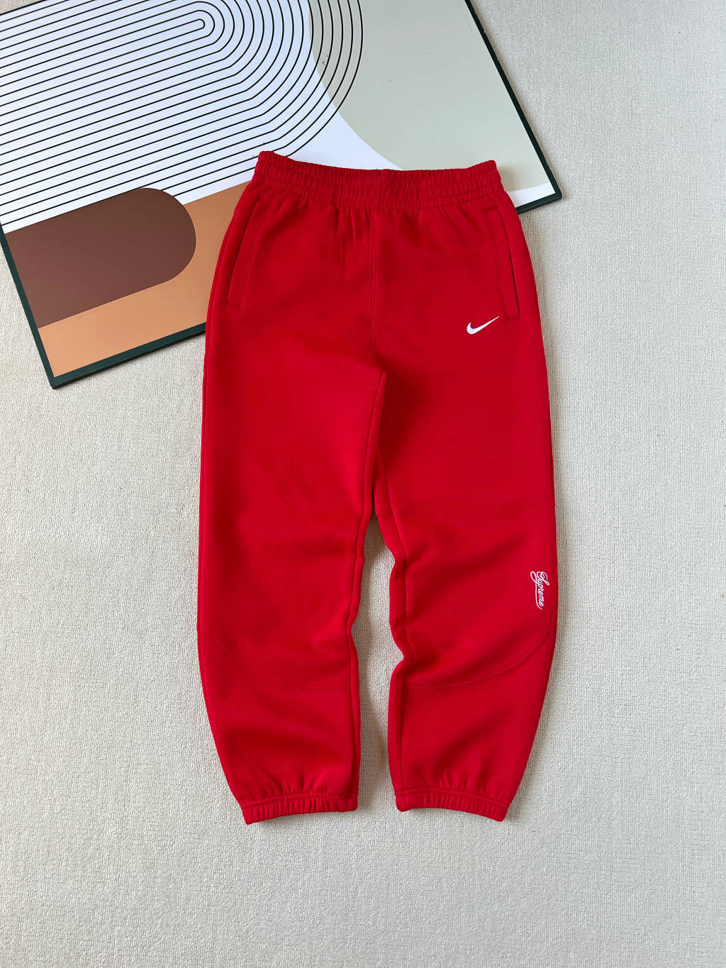 NIKE X SUPREME SWOOSH PANTS