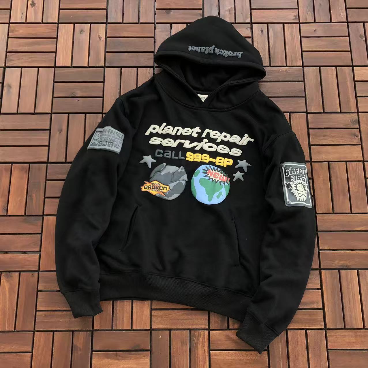 BROKEN PLANETS “PLANET REPAR SERVICES” HOODIE