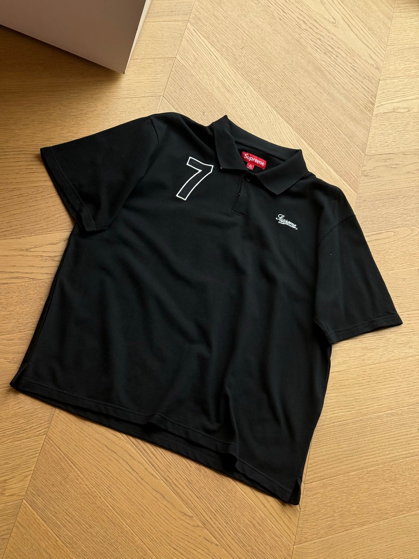 SUPREME WORLD FAMOUS POLO SHIRT