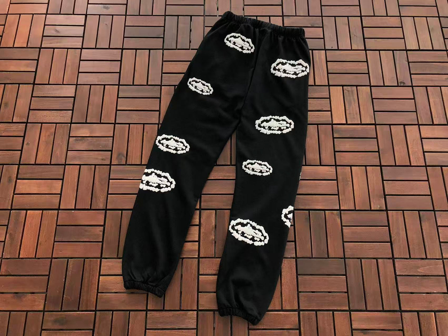 DENIM TEARS X CORTEIZ WREATH PRINT PANTS